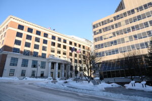 Juneau’s Dimond Courthouse and the Capitol building are seen in the afternoon light on Jan. 18, 2024. (Photo courtesy Claire Stremple/Alaska Beacon)