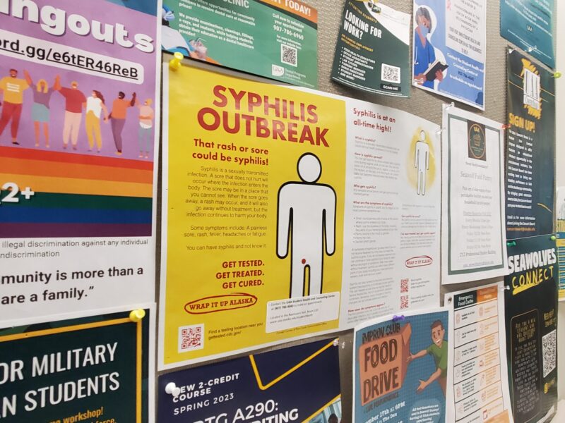 A poster on a bulletin board at the University of Alaska Anchorage's School of Allied Health, seen on Nov. 30, 2022, warns about the state's increasing rates of syphilis. State officials now recommend that adults under 45 get routinely tested for syphilis at least once a year, with more testing as needed to prevent passage of the infection from pregnant women to their fetuses. (Photo courtesy Yereth Rosen/Alaska Beacon)