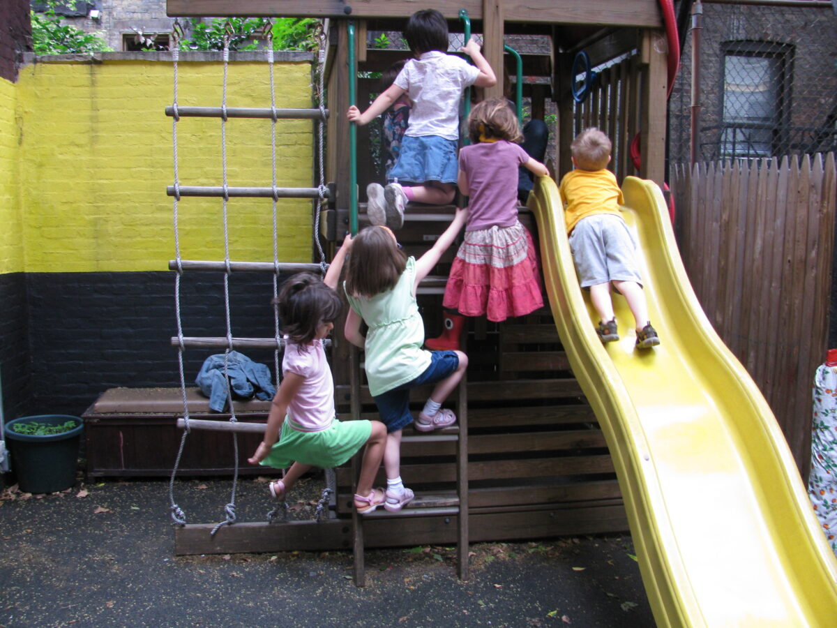 A pre-K class scrambling up a playground. (Photo by Kim Hester/Creative Commons)