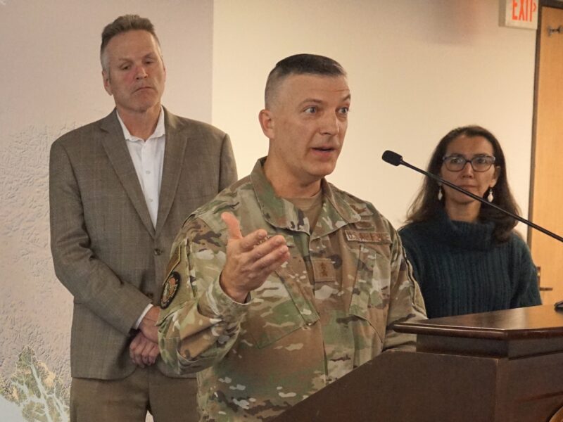 Adjutant General Torrence Saxe, head of the Alaska National Guard, speaks at a Sept. 23, 2022, news conference in Anchorage. Behind him are Gov. Mike Dunleavy and Rep. Mary Peltola. (Photo by Yereth Rosen/Alaska Beacon)