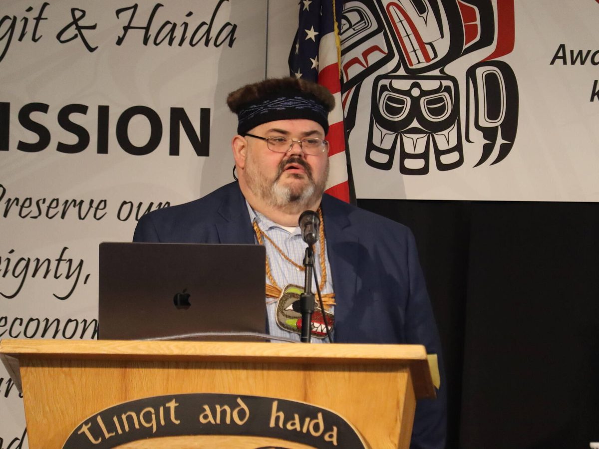 Tlingit and Haida President Richard Chalyee Éesh Peterson delivers his State of the Tribe speech to delegates during the opening of the 89th annual Tribal Assembly on Wednesday morning at Elizabeth Peratrovich Hall. (Mark Sabbatini / Juneau Empire)