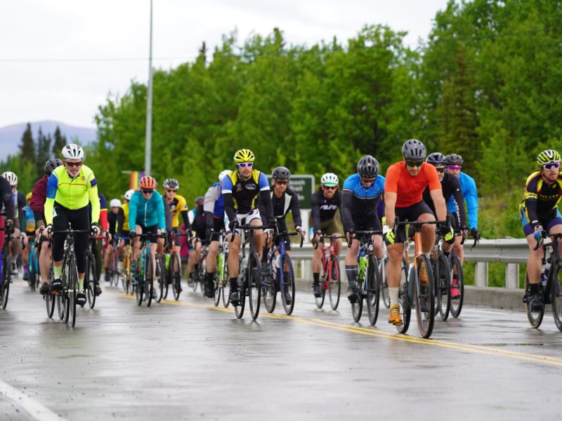Riders in the annual Kluane Chilkat International Bike Relay headed out of cool, wet weather in Haines Junction and toward a hot, sunny finish in Haines, Alaska. (Lex Treinen/for the Chilkat Valley News)