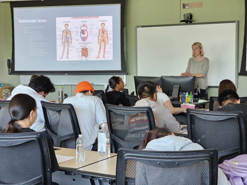 Students with the Della Keats precollege program attend a lecture at the University of Alaska Anchorage campus in 2024. (Photo by Chanmi Joo)
