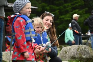 (File photo/Chilkat Valley News) A family fishes on the Chilkoot River un 2021.