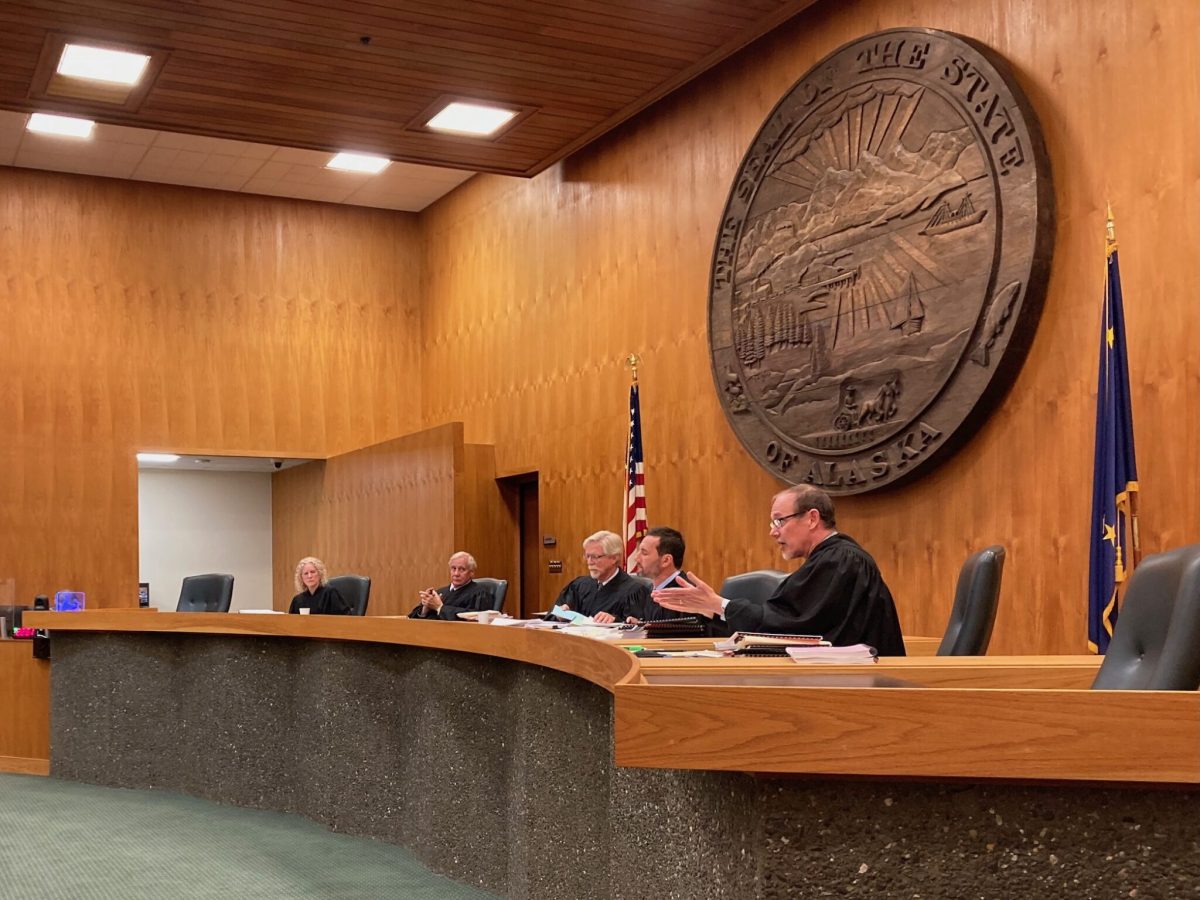 Alaska Supreme Court Justice Jude Pate, right, asks a question during oral arguments in a case concerning correspondence education allotments, on June 27, 2024, in the Boney Courthouse in Anchorage. (Photo by Andrew Kitchenman/Alaska Beacon)