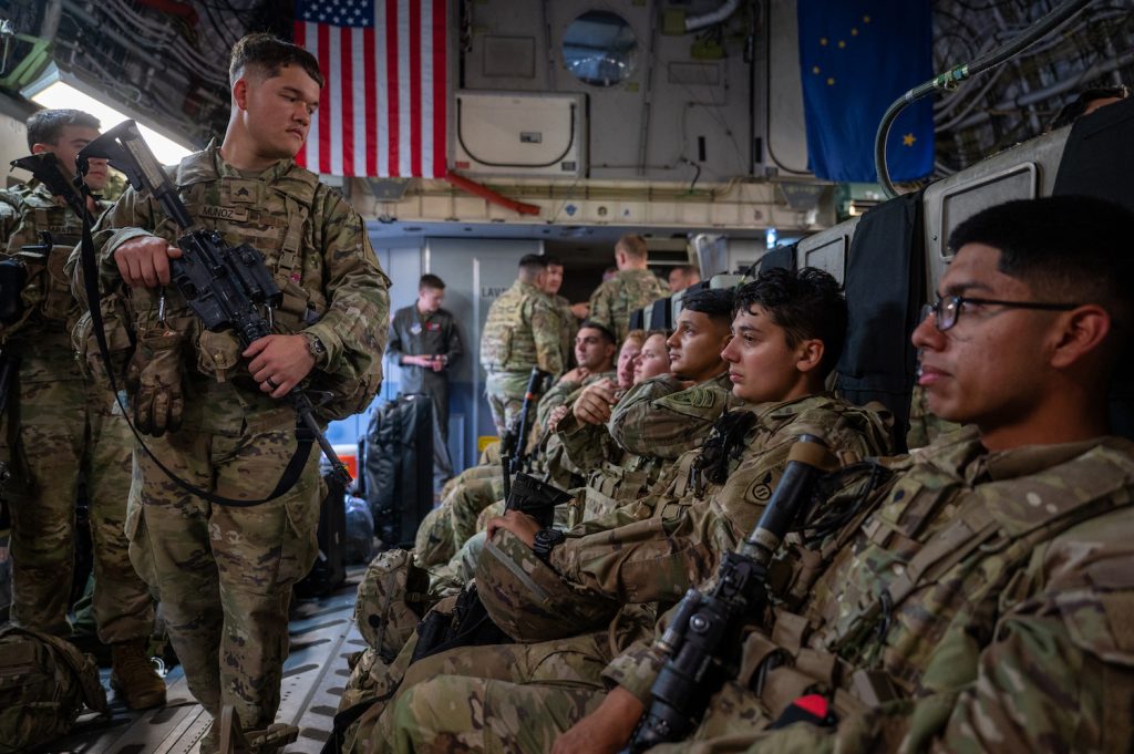 U.S. Army Soldiers assigned to 1st Battalion, 501st Parachute Infantry Regiment, 2nd Infantry Brigade Combat Team (Airborne), 11th Airborne Division, board a U.S. Air Force C-17 Globemaster III assigned to the 176th Wing, Alaska Air National Guard, ahead of a force projection operation to Shemya Island in the North Pacific Ocean, at Joint Base Elmendorf-Richardson, Alaska, Sept. 11, 2024. Conducting operations across the varied terrain of Alaska makes 11th Airborne Division soldiers experts in adjusting to ever-changing conditions, a key capability in a region like the Indo-Pacific. (U.S. Air Force photo by Airman 1st Class Hunter Hites)
