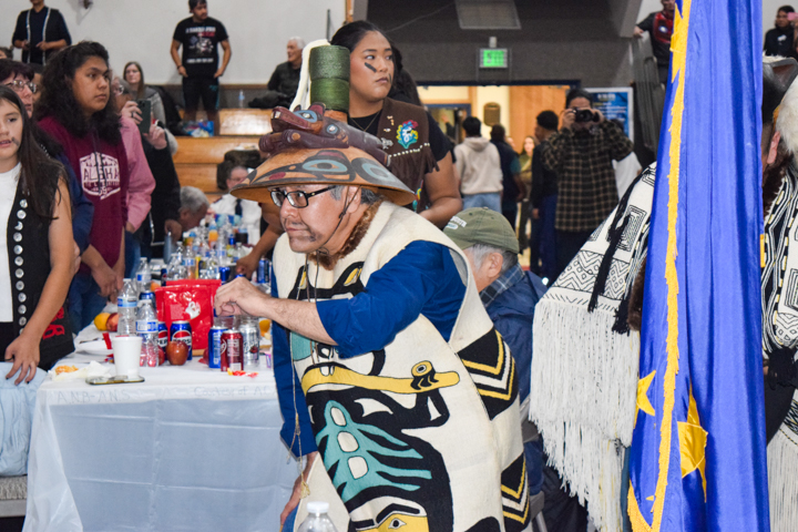 Daniel Johnson Jr, a leader of the Deisheetaan clan, dances during the potlatch or ku.éex’ on Saturday, Oct. 26, 2024, in Angoon, Alaska. (Francisco Martínezcuello/Chilkat Valley News)
