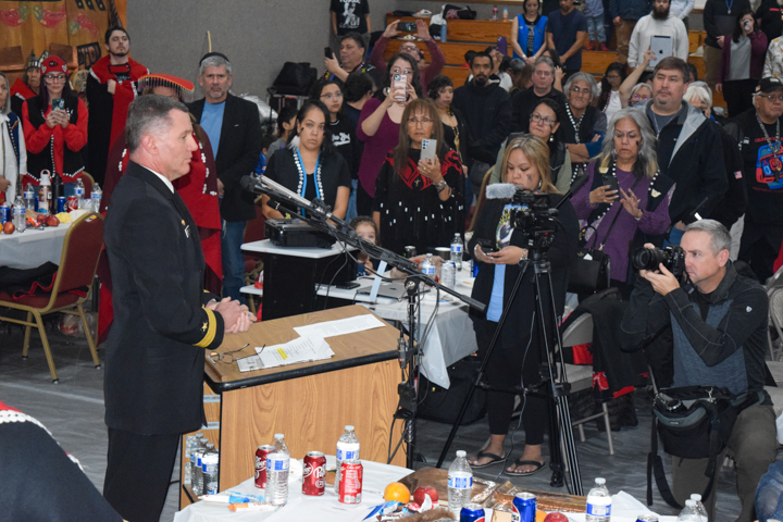 Rear Adm. Mark Sucato, commander of Navy Region Northwest, issues an official apology to the village of Angoon on behalf of the Navy on Saturday, Oct. 26, 2024, in Angoon, Alaska. (Francisco Martínezcuello/Chilkat Valley News)