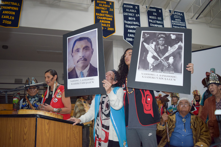 Darlene McKinley, center, weeps during her sister, Jamiann S’eiltin Hasselquist's speech on Oct. 26, 2024 in Angoon, Alaska. McKinley is a descendant of Billy Jones, who was 13 at the time of Angoon Bombardment in 1882. Jones told the story of the attack to an anthropologist in 1949. Riley is the great-grandnephew of Michael Healy, who commanded the U.S. Revenue Cutter Thomas Corwin, which participated in the bombardment of Angoon in 1882. (Francisco Martínezcuello/Chilkat Valley News)