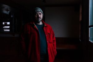 Travis Kukull stands inside the building where he plans to open a new restaurant, Deer Heart, in the spring of 2025 in Haines, Alaska. (Rashah McChesney/Chilkat Valley News)