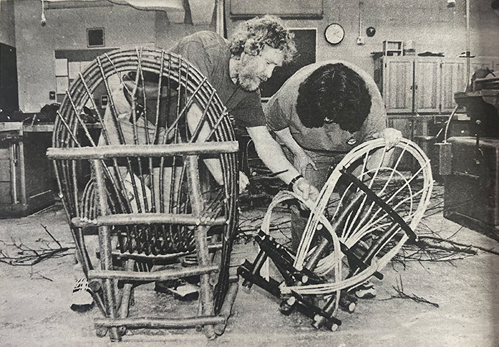 In this Oct. 28, 1999 file photo woodworker Harbey VanPatten shows Pam Sloper how to weave alder branches to make a lounge chair in a class sponsored by Haines Community Education. About a half-dozen enrolled in the twig furniture class, making chairs, couches and a table. (File photo/Chilkat Valley News)