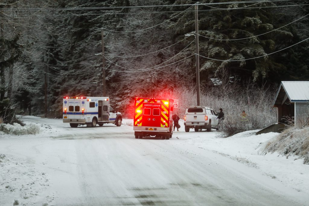 Emergency personnel block Fourth Avenue as police responded to calls about shots fired in a nearby neighborhood on Monday, Dec. 9, 2024, in Haines, Alaska.
