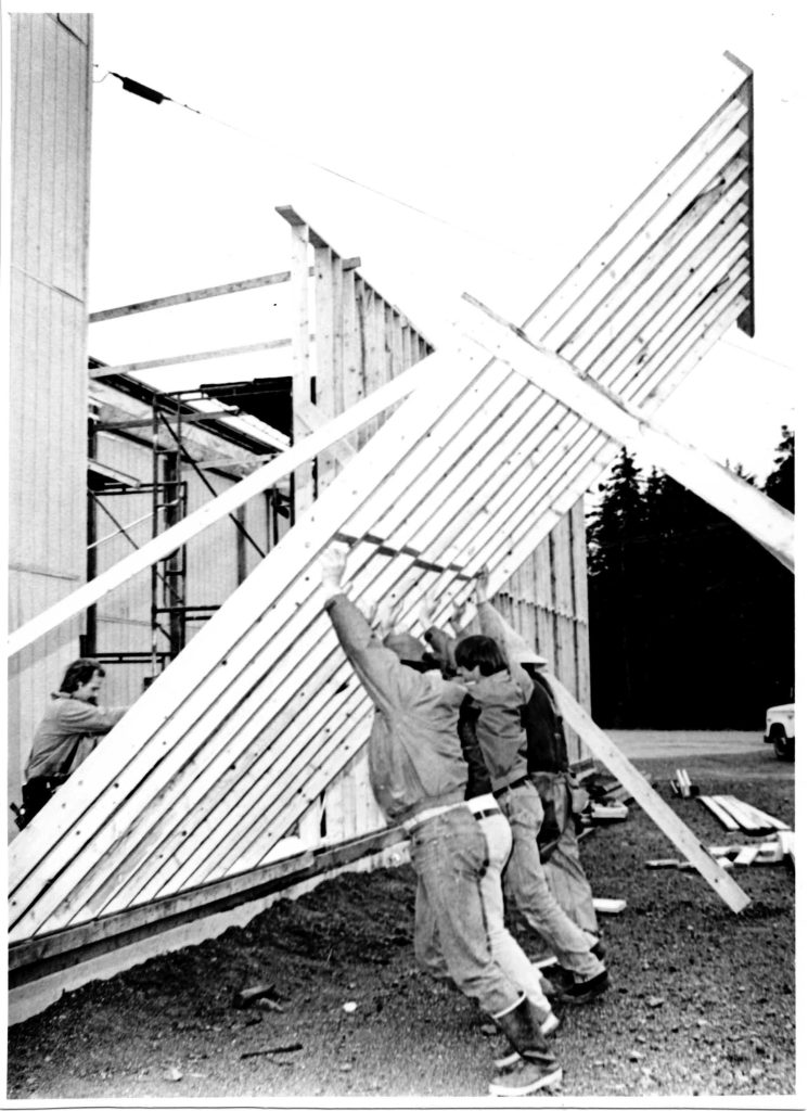(File photo/Chilkat Valley News, Tom Morphet)
In this Oct. 28, 1993 file photo, volunteer firemen and carpenters lift a wall into place at the firehall. The expansion will include a truck bay, fire extinguisher shop and "hazard area" for handling of contaminated material.
