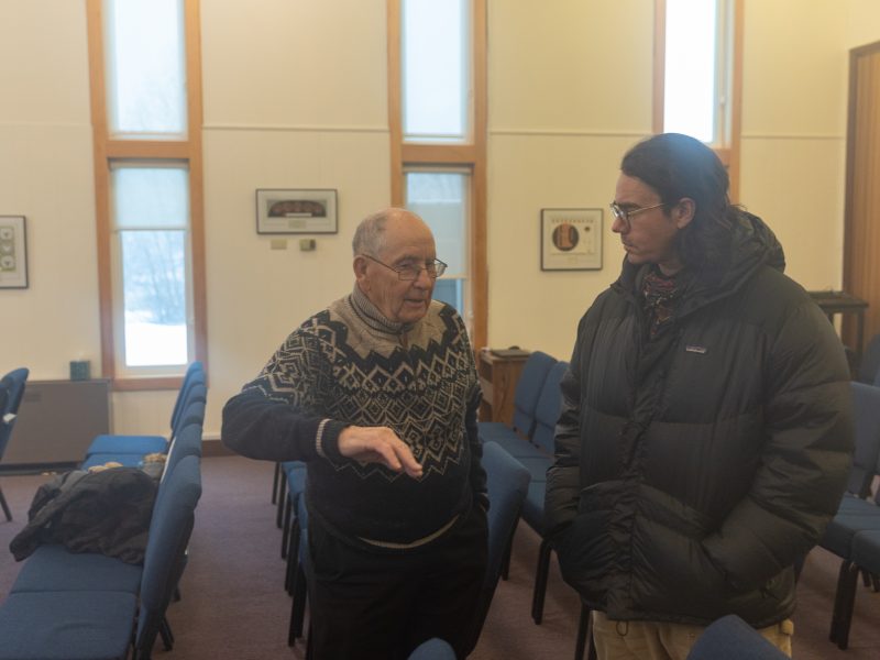 Stan Jones, left, talks with guests during his 93rd birthday party on Sunday, Jan. 5, at the Haines Presbyterian Church in Haines, Alaska.