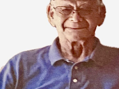 Frank Holmes dies at 89